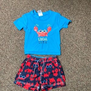 Crab themed rash guard too and trunks